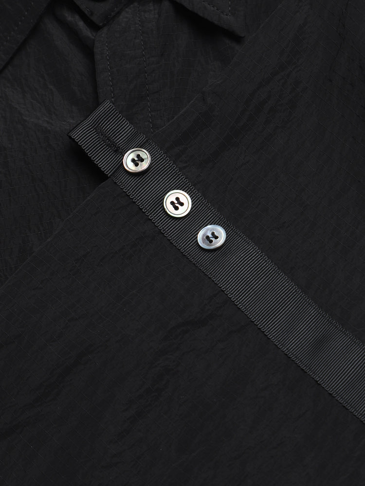 Men's shirt by Thom Browne, shirt detail view