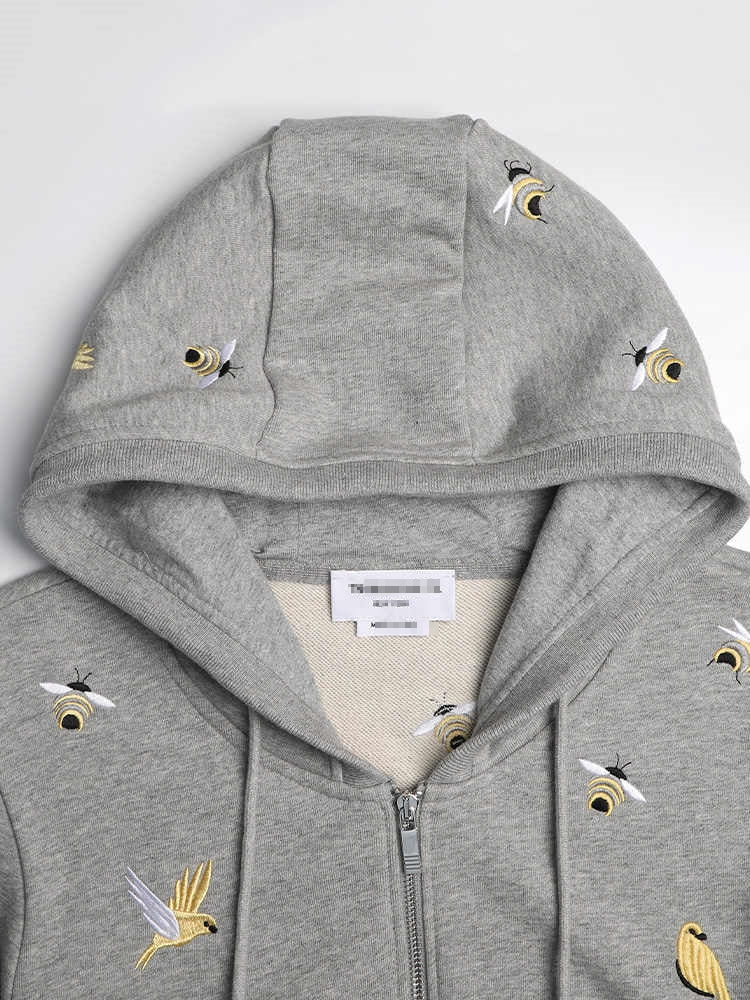 Premium 100% Cotton Embroidered Hoodie - Artistic Zip - Up Hooded Sweatshirt by Thom Browne, garment detail view