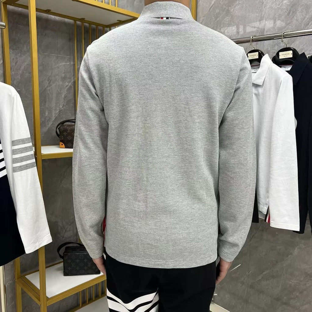 Lapel long-sleeved T-shirt by Thom Browne, product detail view