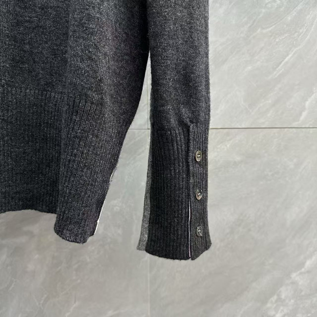 Unisex Two-Tone Cable Knit V-Neck Cardigan - Grey Wool by Thom Browne, outerwear detail view