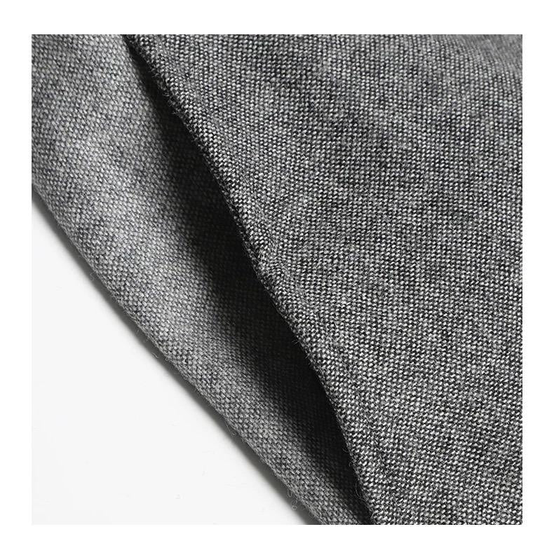 Mid-length coat by Thom Browne, outerwear detail view