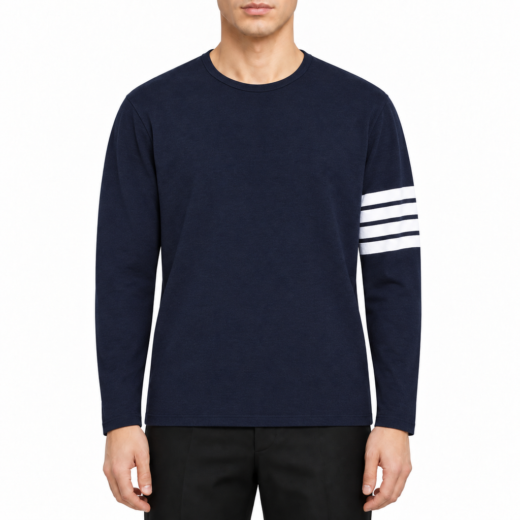 Long-sleeved T-shirt by Thom Browne, modeled on a pure white background