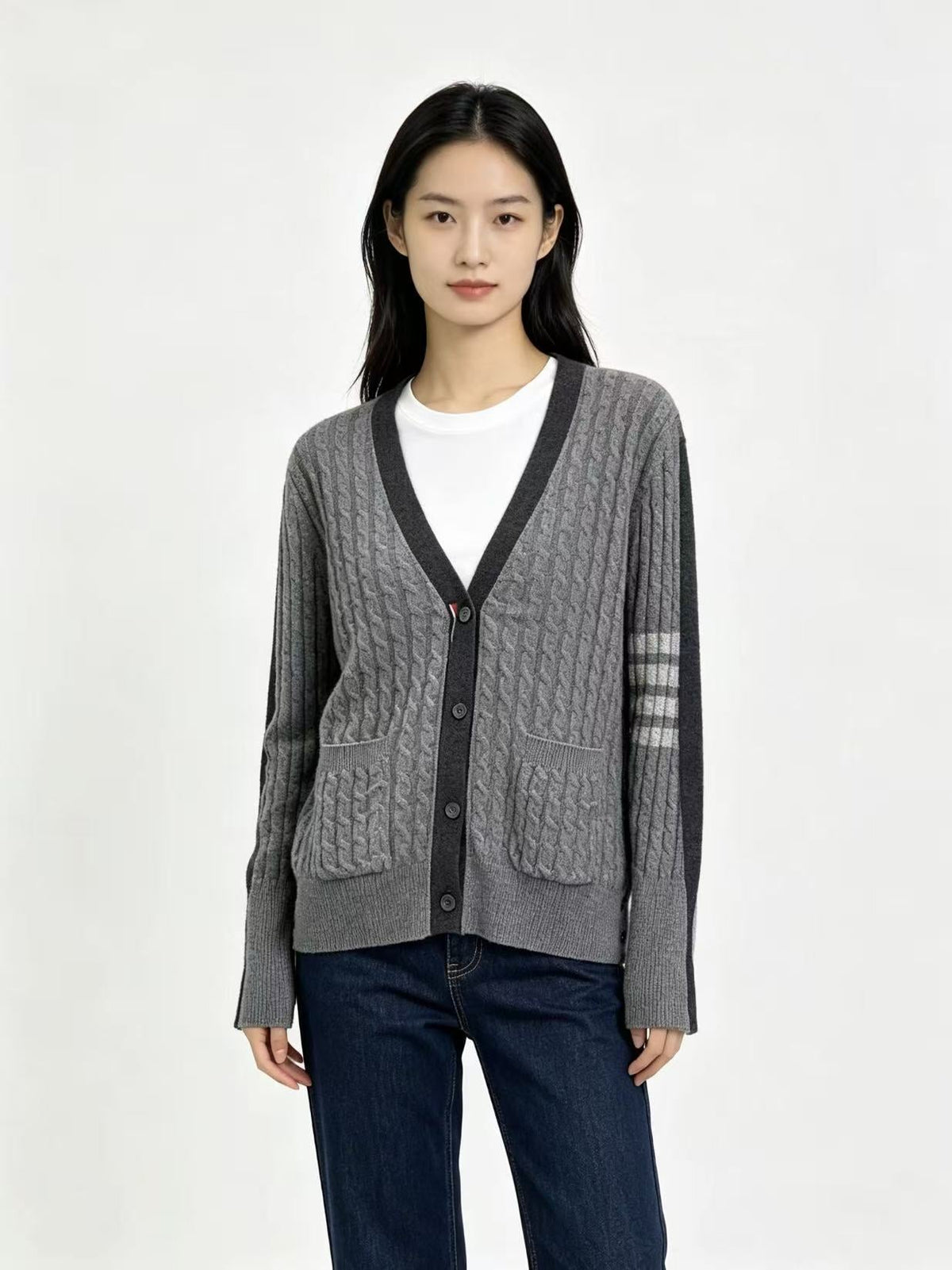 Unisex Two-Tone Cable Knit V-Neck Cardigan - Grey Wool by Thom Browne, outerwear detail view