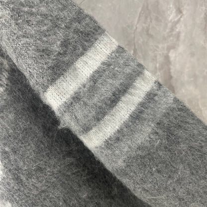 Men's wool sweater by Thom Browne, knitwear detail view