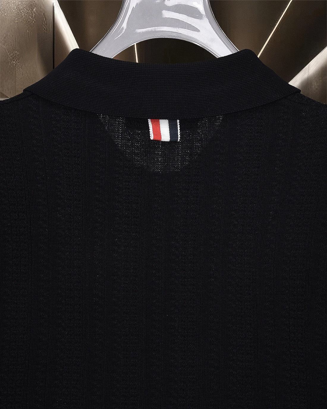 Four-Bar Stripe Knit Polo by Thom Browne, product detail view