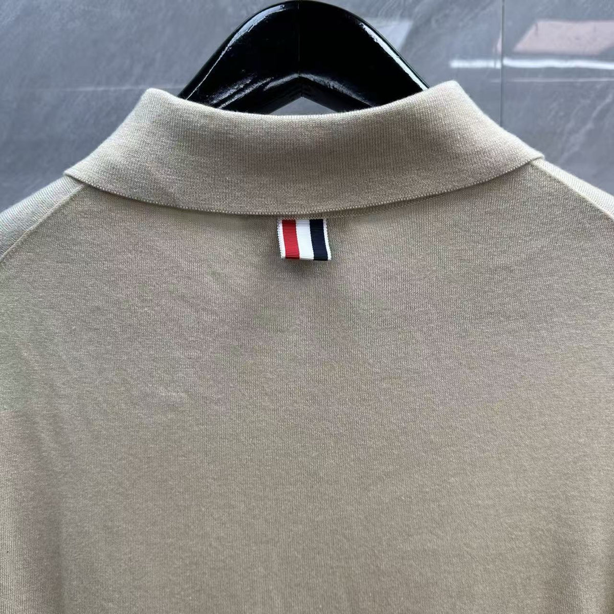 Four-Bar Polo Collar Short Sleeve Shirt by Thom Browne, product detail view