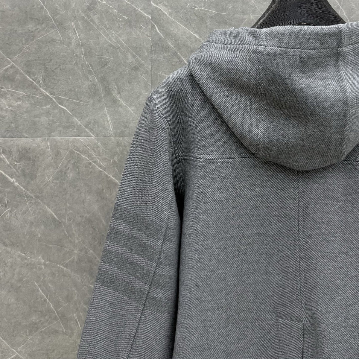 Hooded jacket by Thom Browne, outerwear detail view
