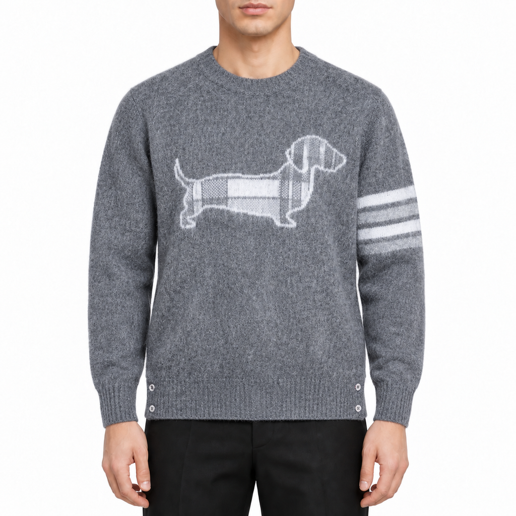 Men's wool sweater by Thom Browne, modeled on a pure white background
