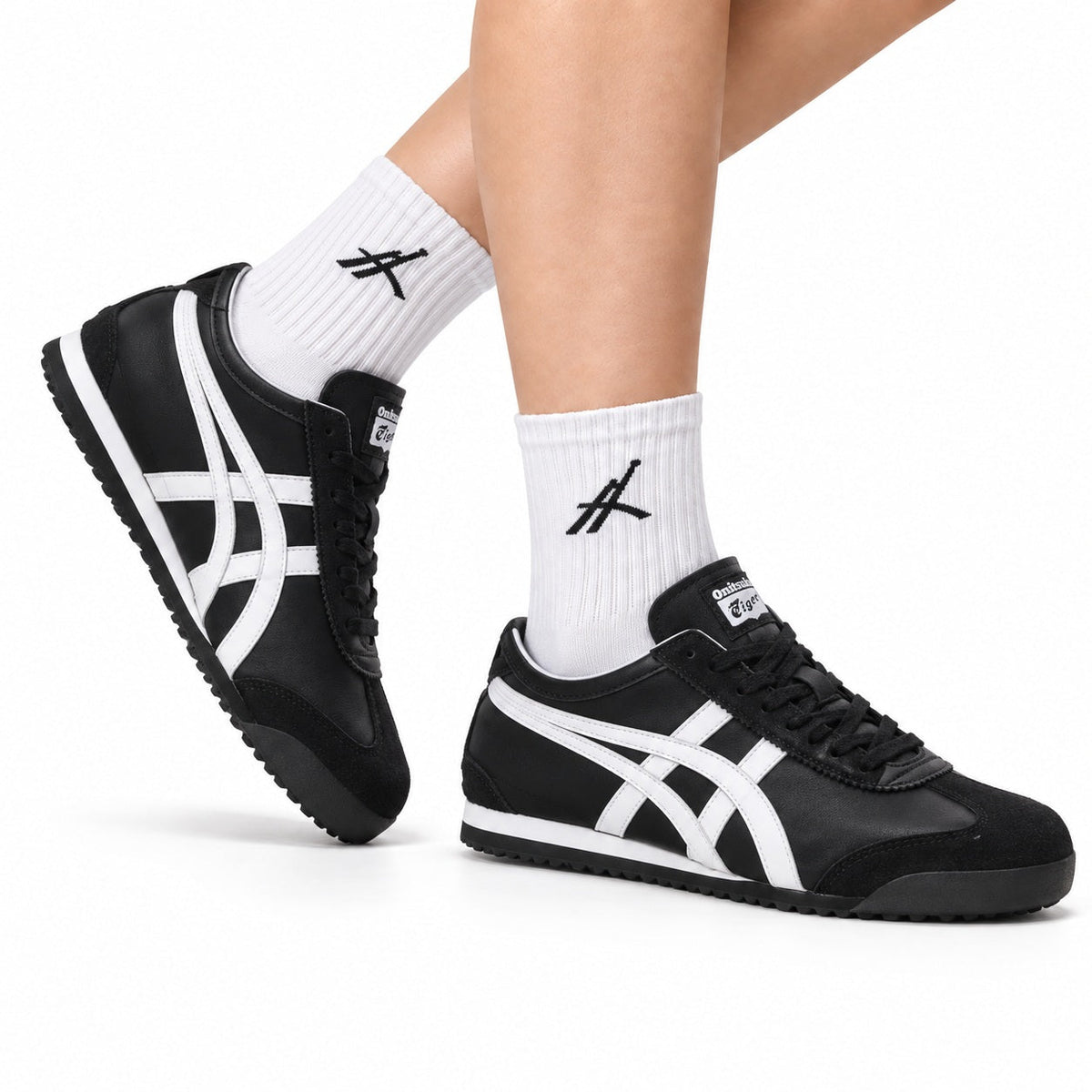 Onitsuka Tiger Retro Low Top Black White Unisex Shoes Style 22 main angled pair view